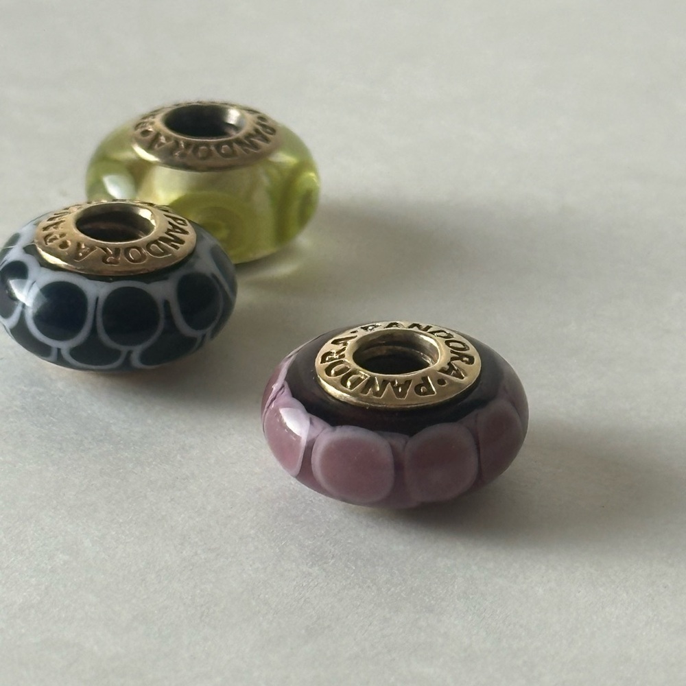 2011 retired solid 14k gold purple Pandora…